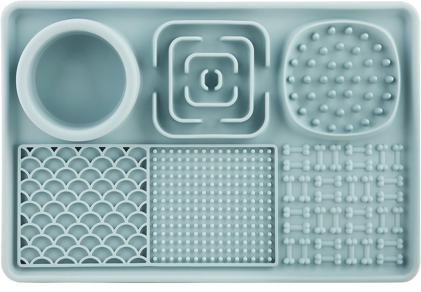 Nærbillede af slikkemåtten, der viser de forskellige teksturerede mønstre, designet til at forlænge spisetiden og forhindre, at din hund sluger maden.